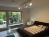 Großzügige Erdgeschosswohnung mit Hobbyraum und Gartenanteil in Traumlage von Fellbach - Schlafzimmer
