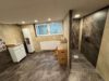 Familientraum am Waldrand: Modern saniertes Einfamilienhaus mit sehr großem Garten, PV & Sauna - UG Ruhebereich / Dusche