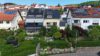 Moderne Doppelhaushälfte mit traumhaftem Weitblick in sonniger Hanglage von Korb zu verkaufen - Hausansicht Garten