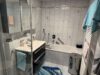 Sehr helle und großzügige 3,5-Erdgeschoss-Wohnung mit Garten in Scharnhausener Park - Badezimmer