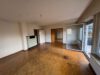 Großzügige sanierungsbedürftige 4 Zimmer-Wohnung mit Balkon am Feldrand von Fellbach - Wohnzimmer