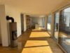 Exklusives Penthouse – Nachhaltiger Wohnluxus mit Alpenblick, Sauna und großzügigen Sonnenterrassen - Wohn-Essbereich
