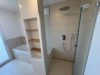 Exklusives Penthouse – Nachhaltiger Wohnluxus mit Alpenblick, Sauna und großzügigen Sonnenterrassen - Badezimmer