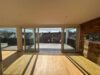 Exklusives Penthouse – Nachhaltiger Wohnluxus mit Alpenblick, Sauna und großzügigen Sonnenterrassen - Wohnzimmer Terrasse