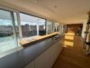 Exklusives Penthouse – Nachhaltiger Wohnluxus mit Alpenblick, Sauna und großzügigen Sonnenterrassen - Küche