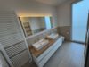 Exklusives Penthouse – Nachhaltiger Wohnluxus mit Alpenblick, Sauna und großzügigen Sonnenterrassen - Badezimmer en Suite