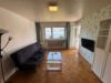 Potenzial in guter Lage – 2-Zimmer-Wohnung mit sonnigem Südbalkon - Wohnzimmer