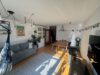 3-Zimmer-Wohnung mit Balkon und Tiefgarage – zentral gelegen und nah am Fellbacher Bahnhof - Wohnzimmer