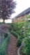 Großzügiges Reiheneckhaus mit Garten, Hobbyraum und Dachausbaureserve (35qm) - Garten